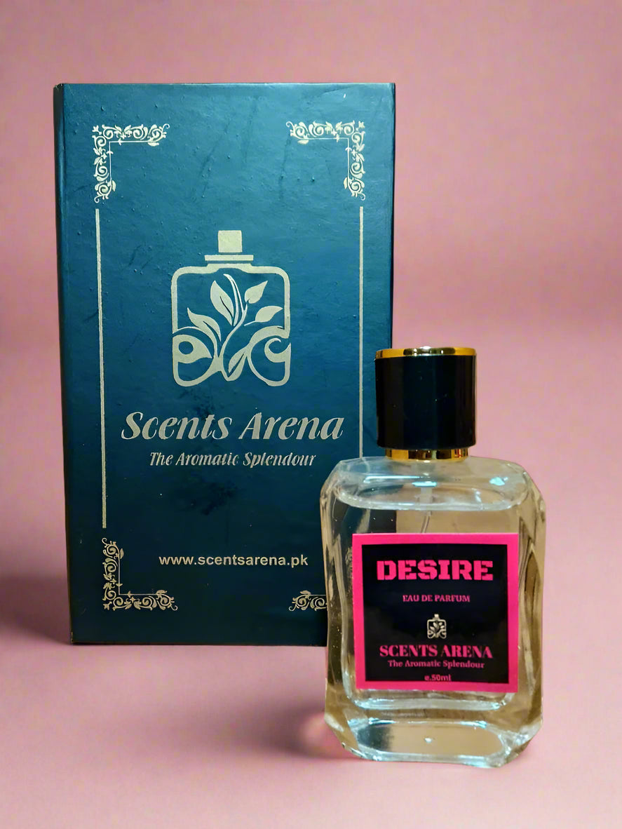 Perfume bottle labeled 'Desire' by Scents Arena with packaging in the background.