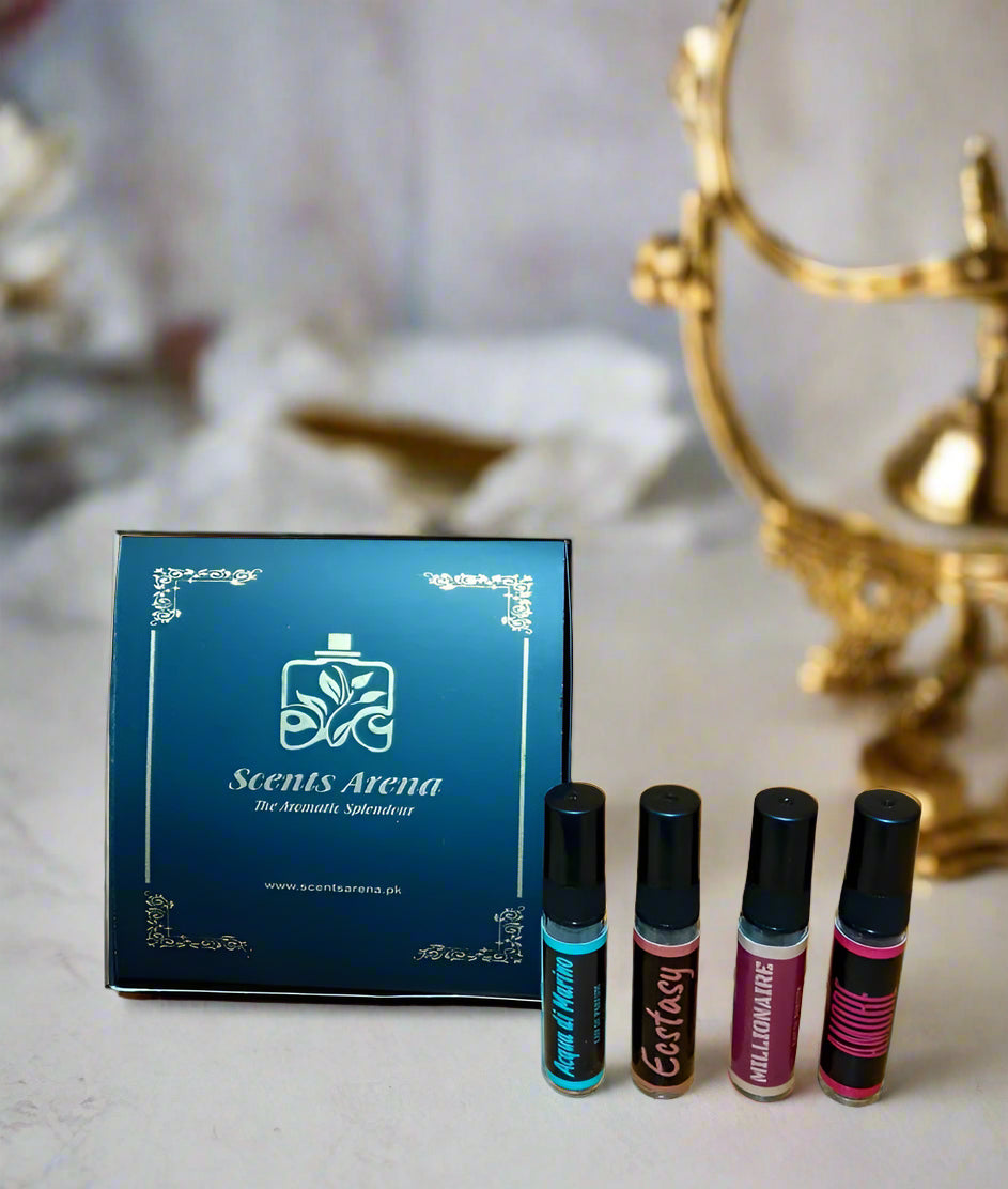 Set of perfume bottles with 'Scents Arena' packaging on a decorative background